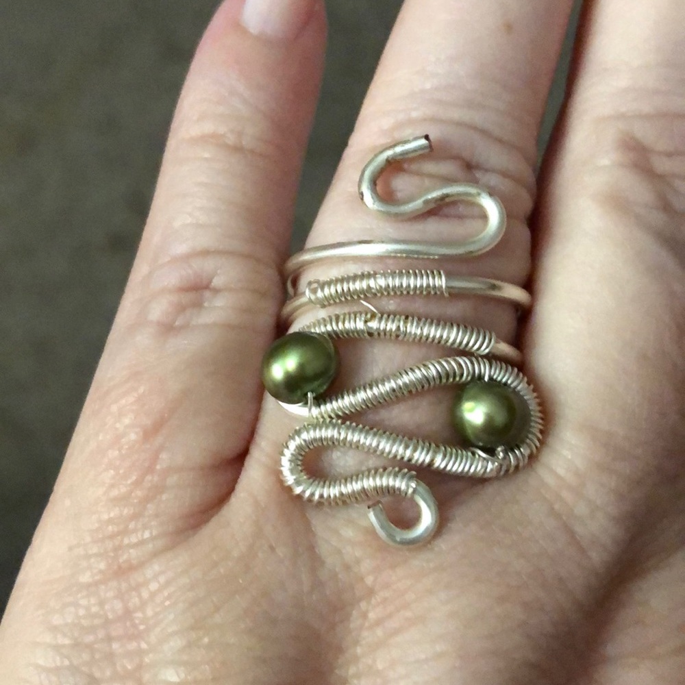 Silver and green ring
